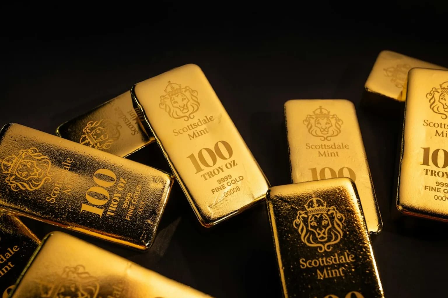 Stacked gold bars and bullion ingots