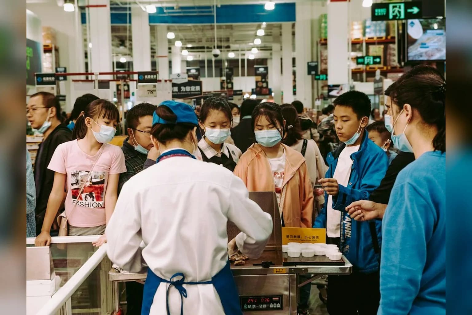 Workers on a manufacturing production line inside a Chinese factory