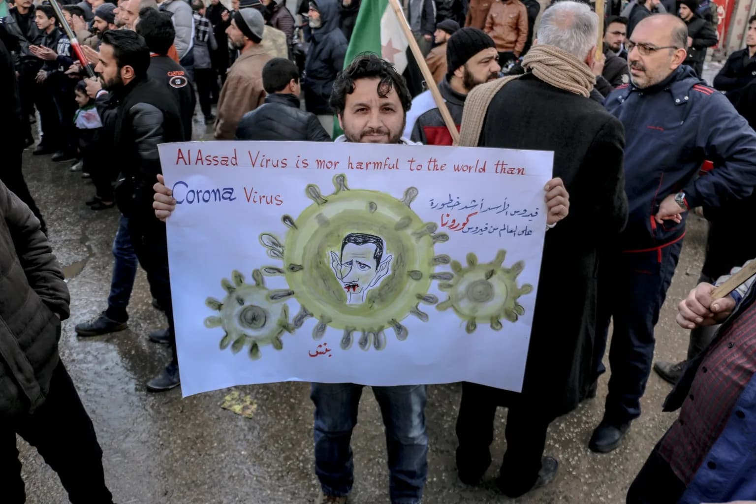 Crowds march through Tehran streets during a large pro-regime rally in response to US threats