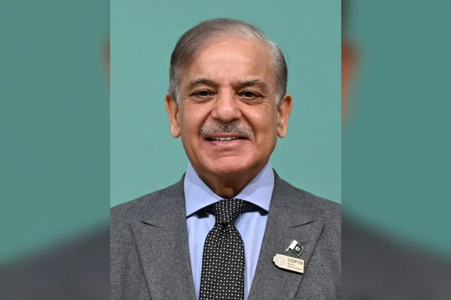 Pakistani Prime Minister Shehbaz Sharif speaking at a podium