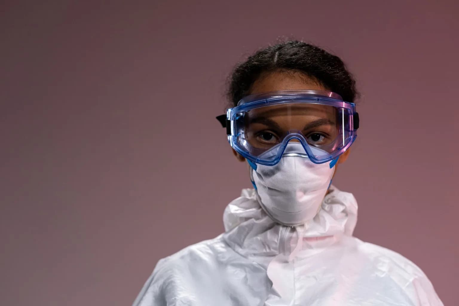 Health workers in full protective equipment during an Ebola outbreak response in central Africa