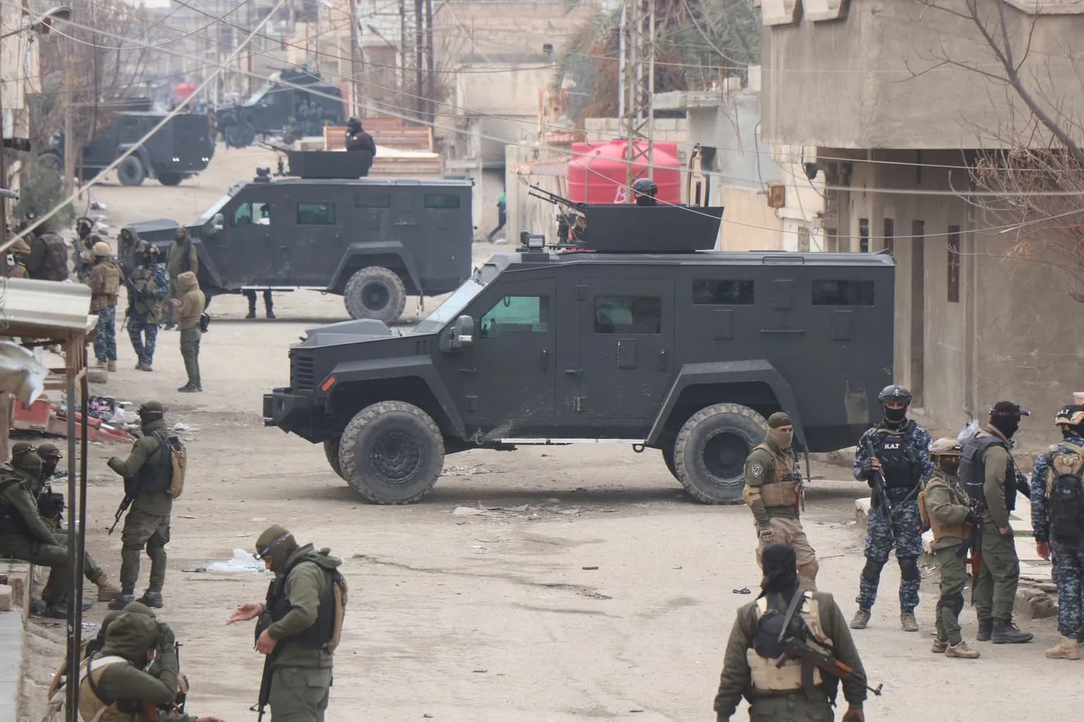 A street scene in Hebron in the occupied West Bank, with Israeli military presence visible