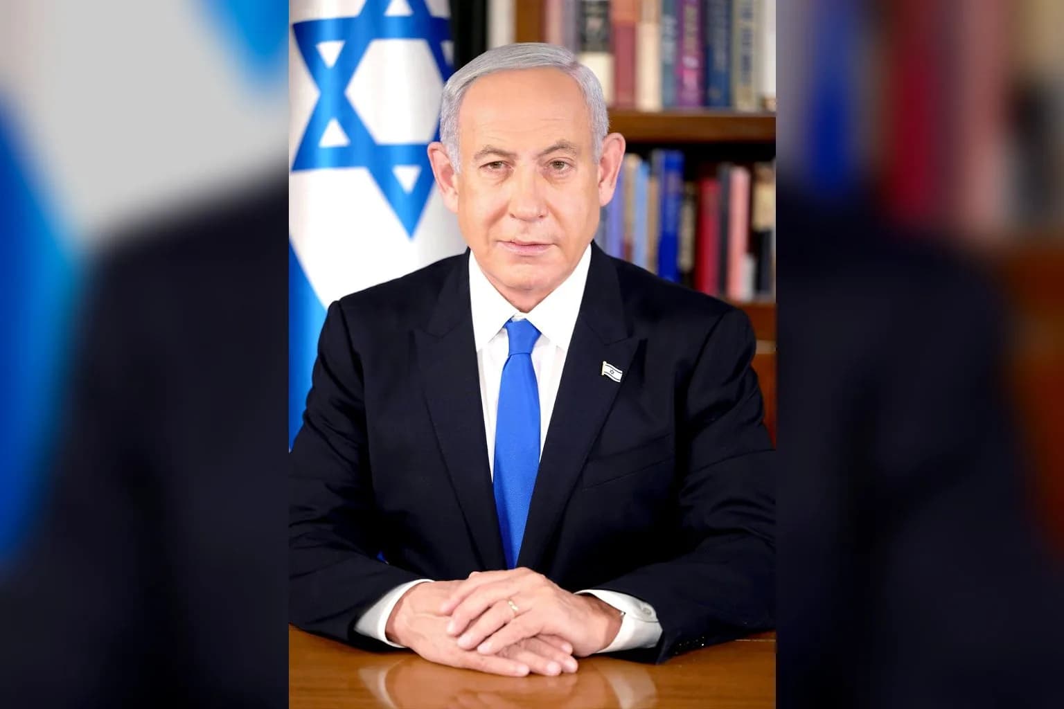 Israeli Prime Minister Benjamin Netanyahu speaking at a podium