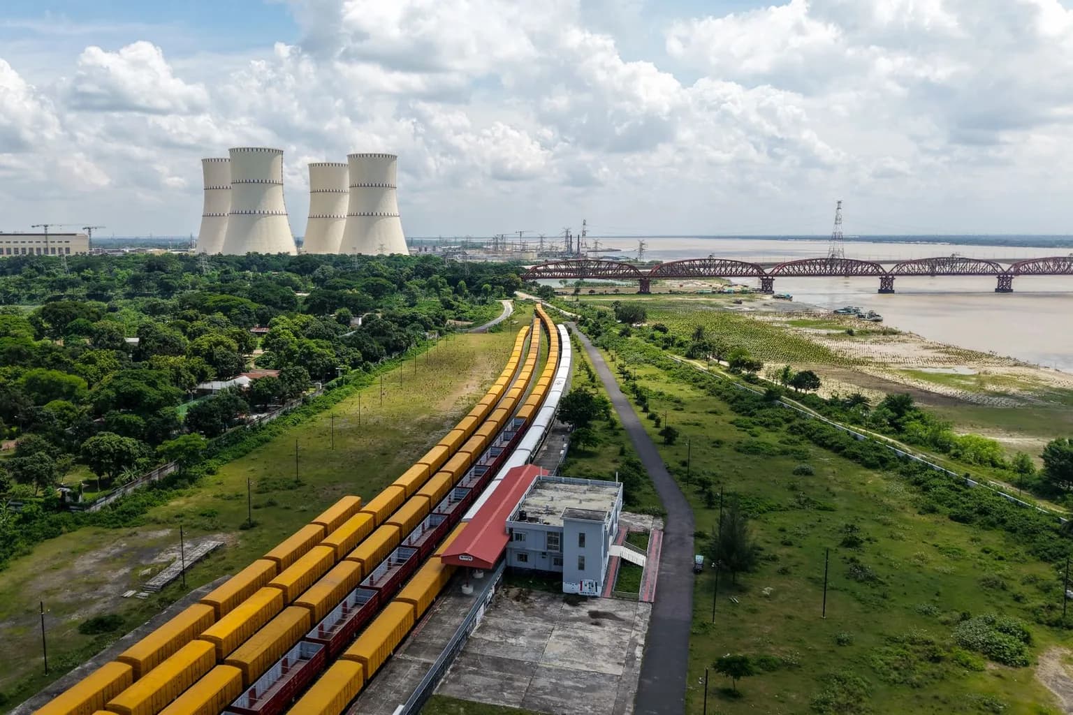 Nuclear power plant with large cooling towers under a clear sky