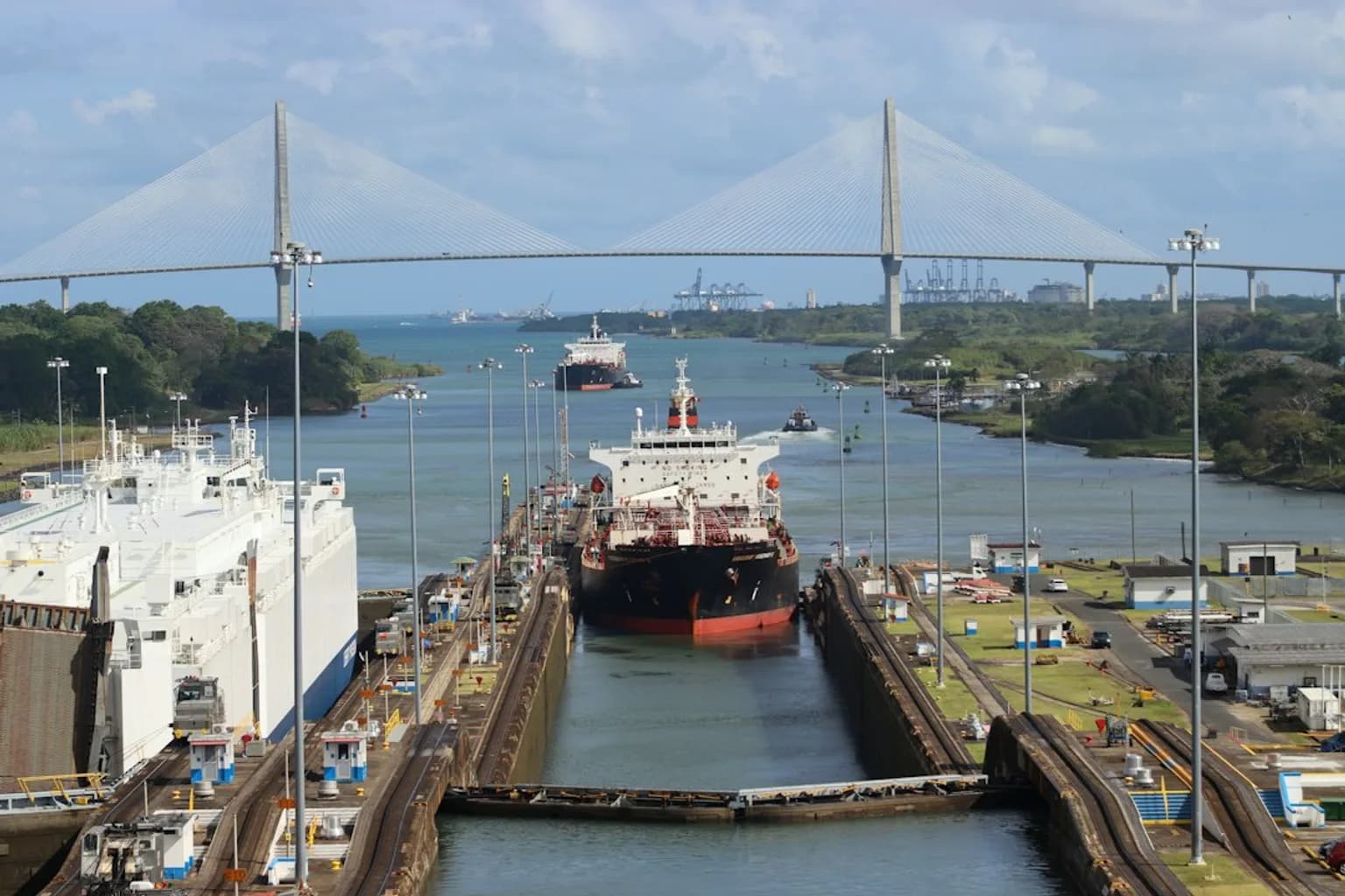 Container ships passing through the Panama Canal locks