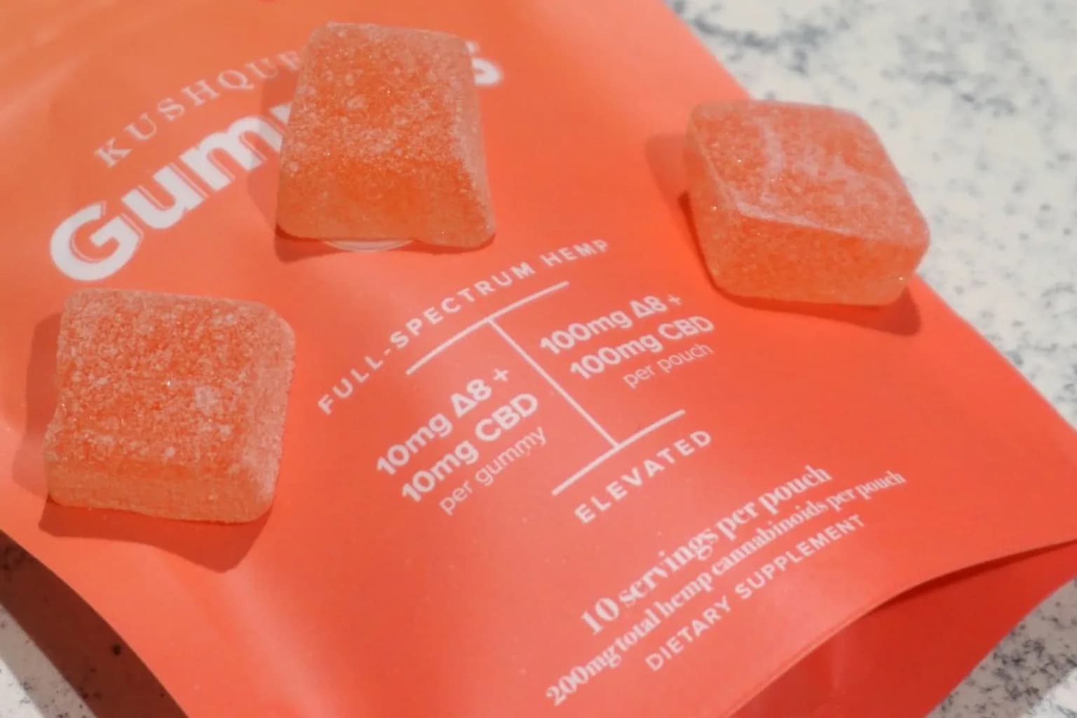 Hemp-derived THC gummies arranged on a production surface in a commercial kitchen
