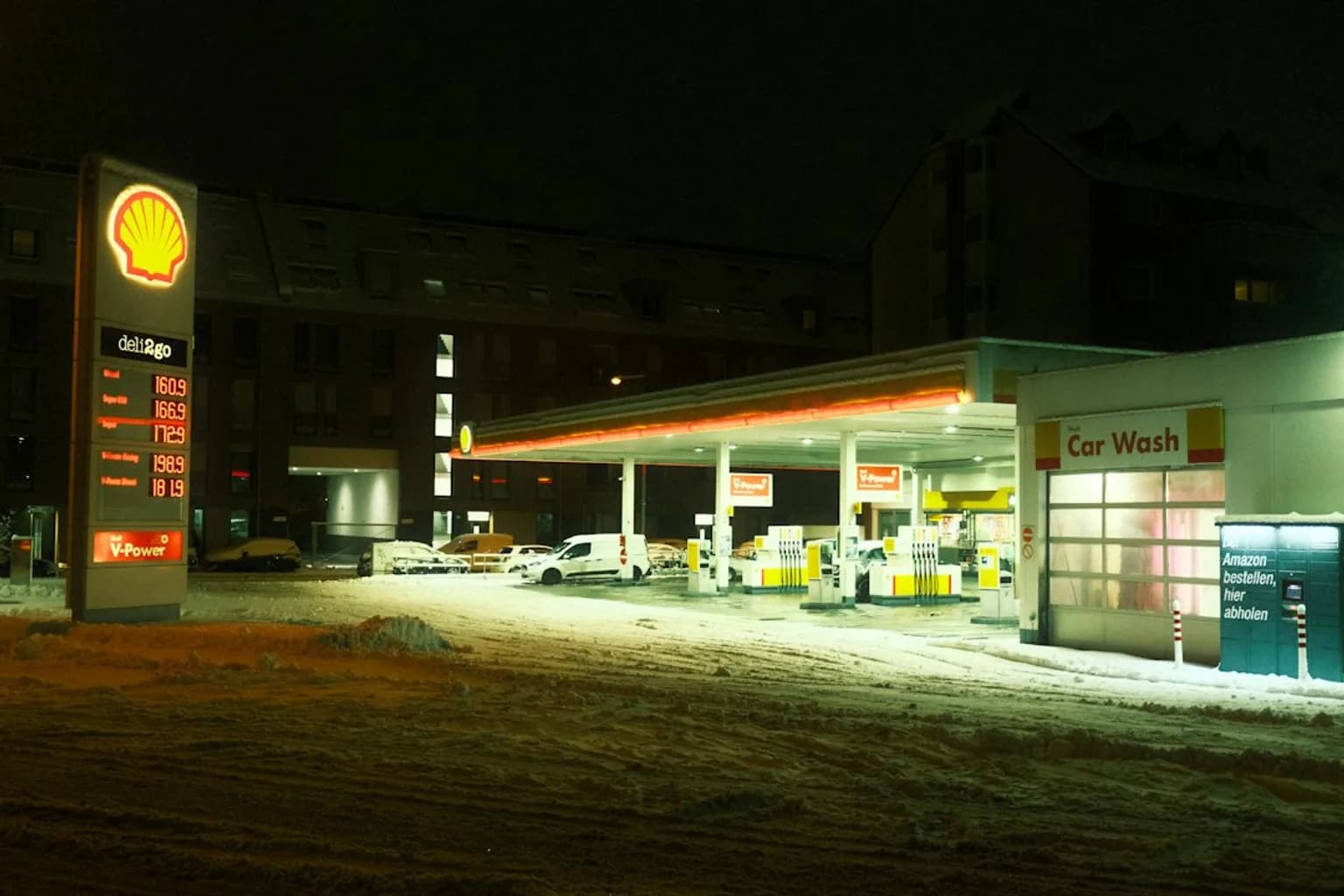 A Shell oil refinery with distillation columns and industrial infrastructure