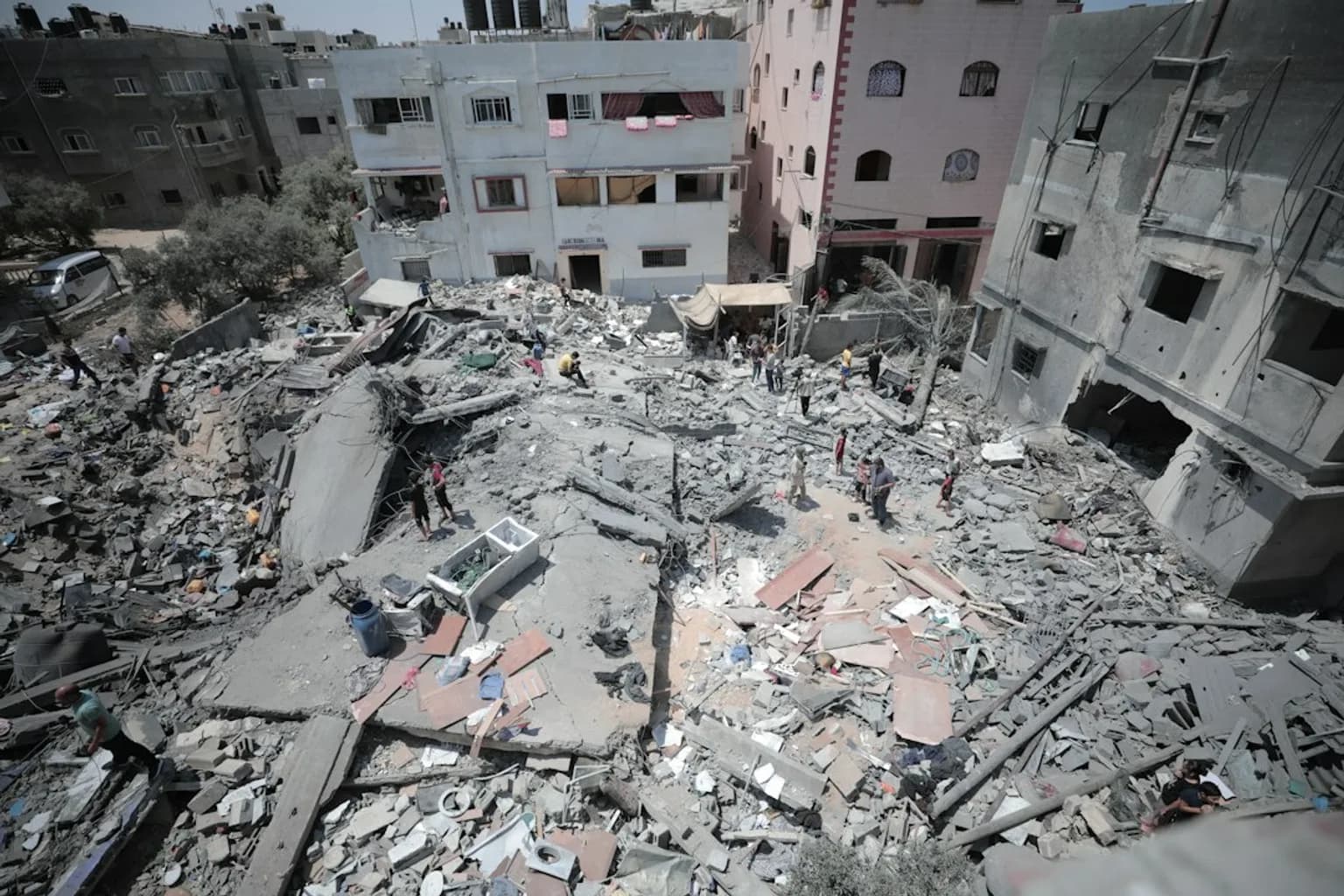 Aerial view of destroyed buildings and rubble across a Gaza neighbourhood