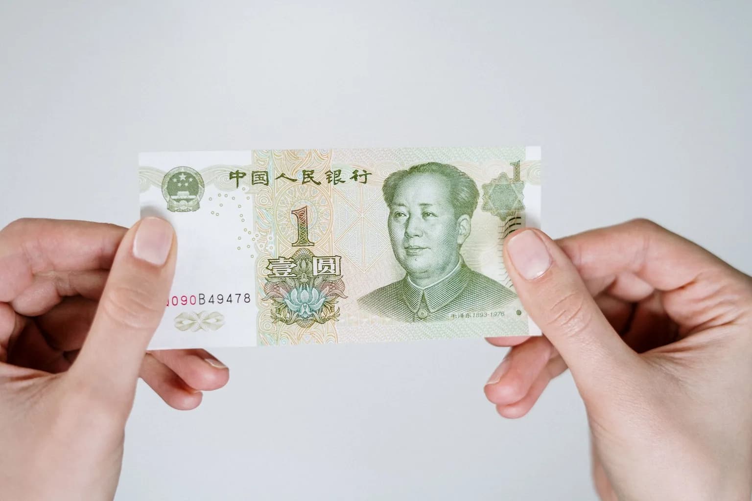 Chinese yuan renminbi banknotes fanned out on a surface
