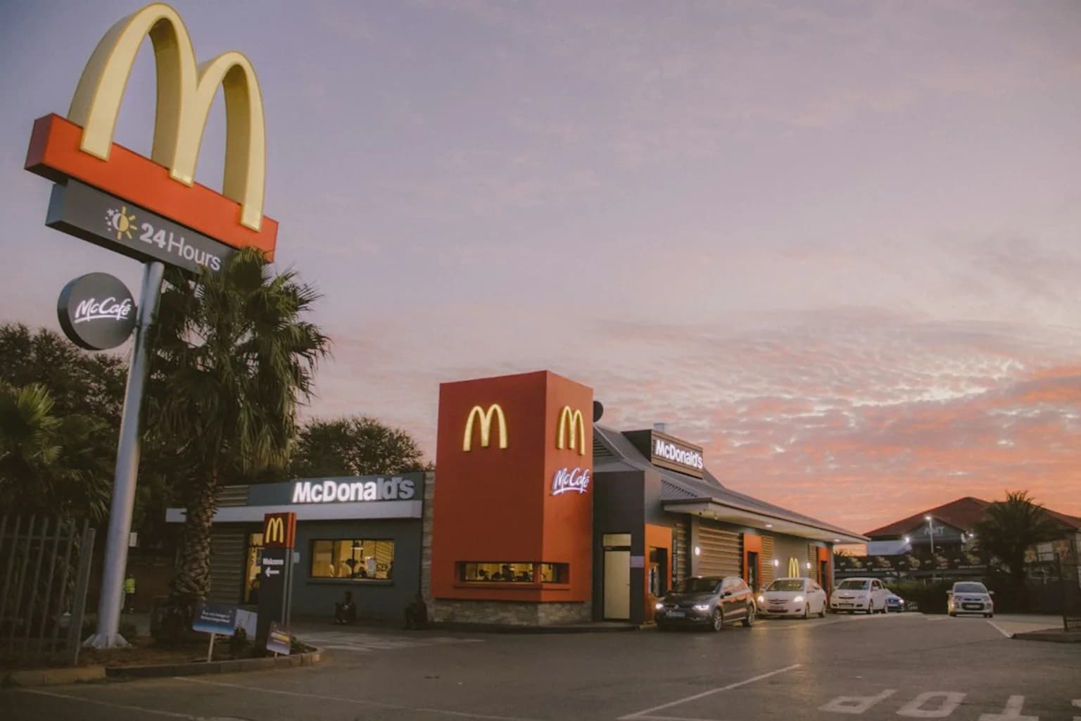 A McDonald's restaurant exterior with the golden arches sign