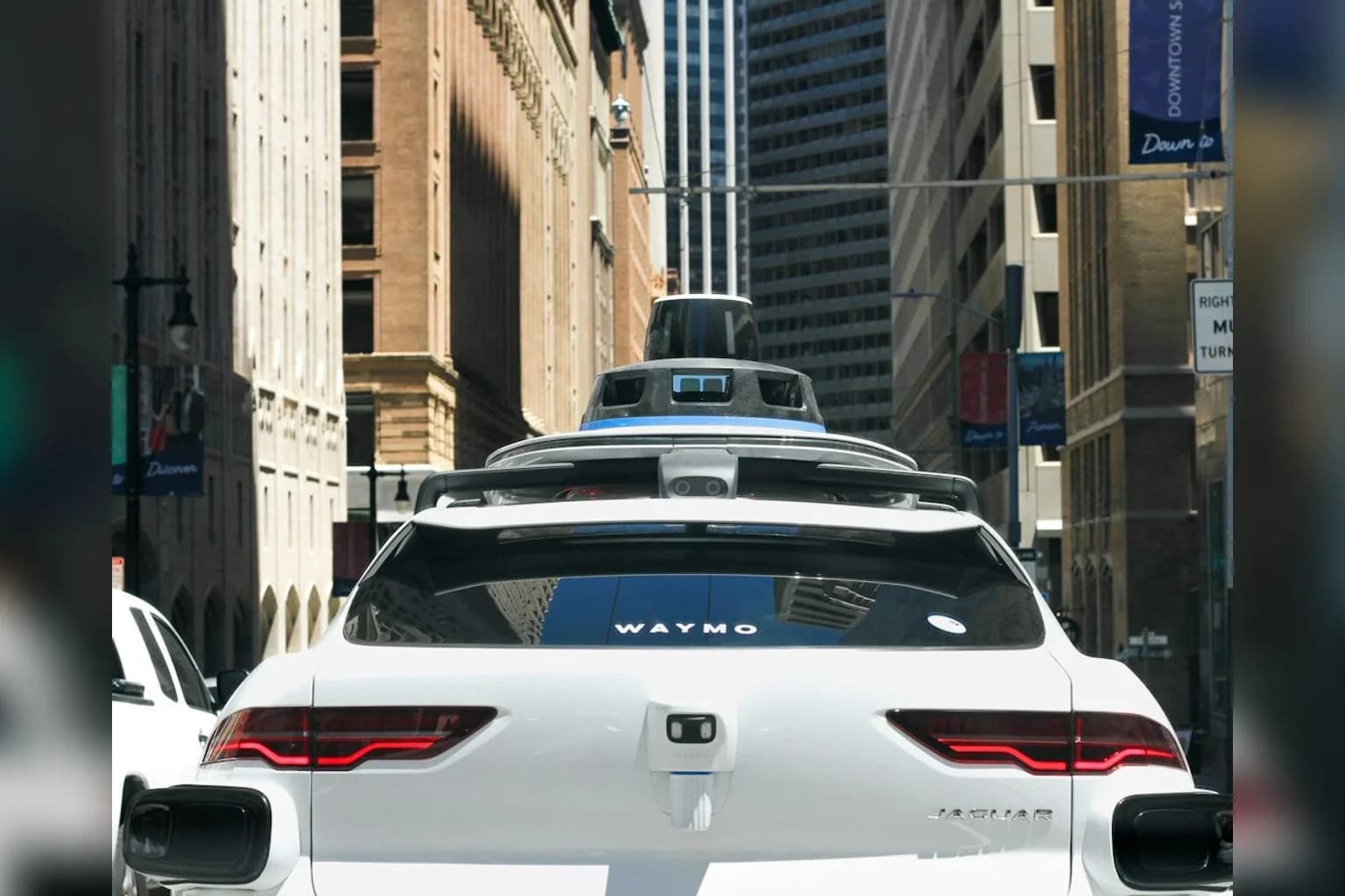 A Waymo self-driving robotaxi on a city street