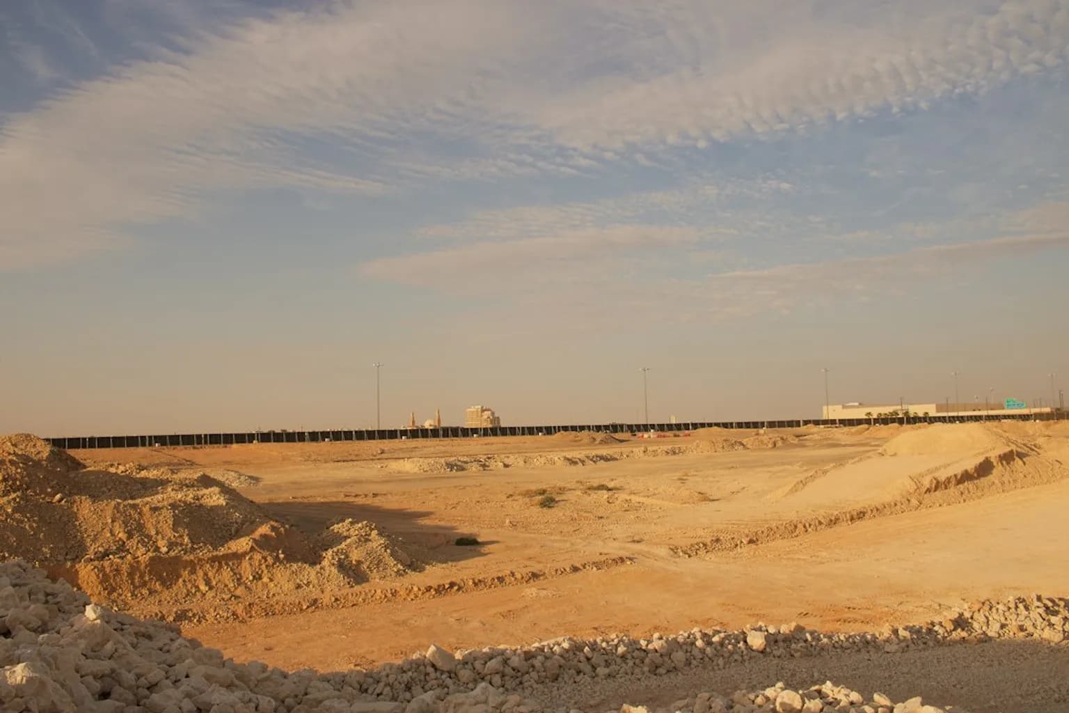 An oil pipeline stretching across the Saudi Arabian desert
