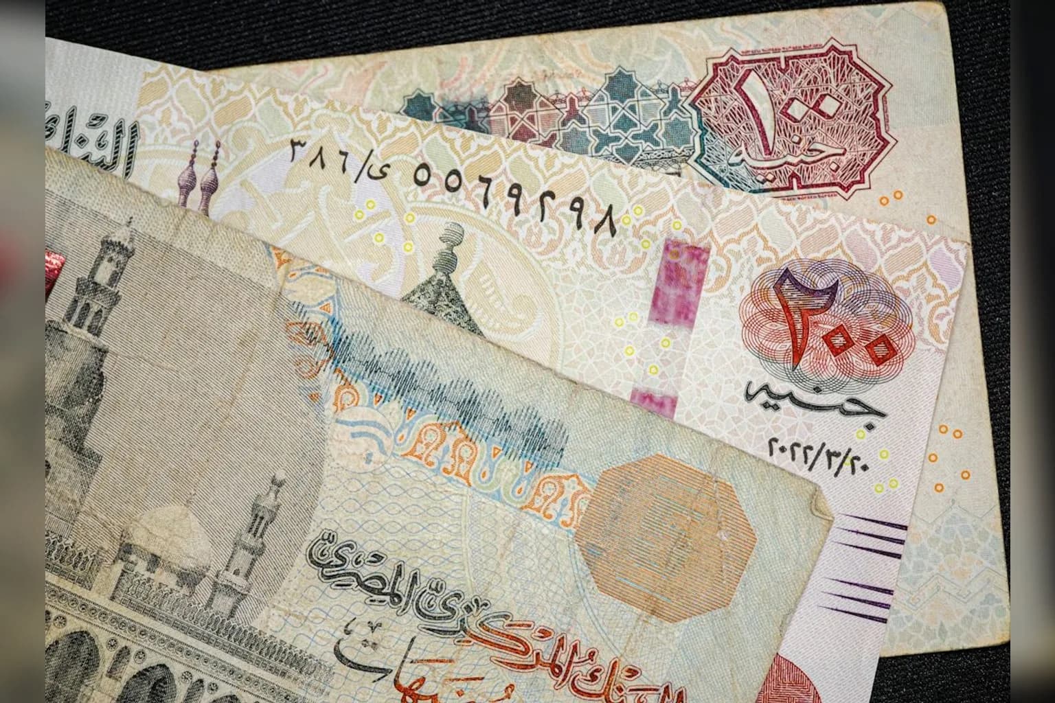 Iranian rial banknotes fanned out, showing the currency's denominations