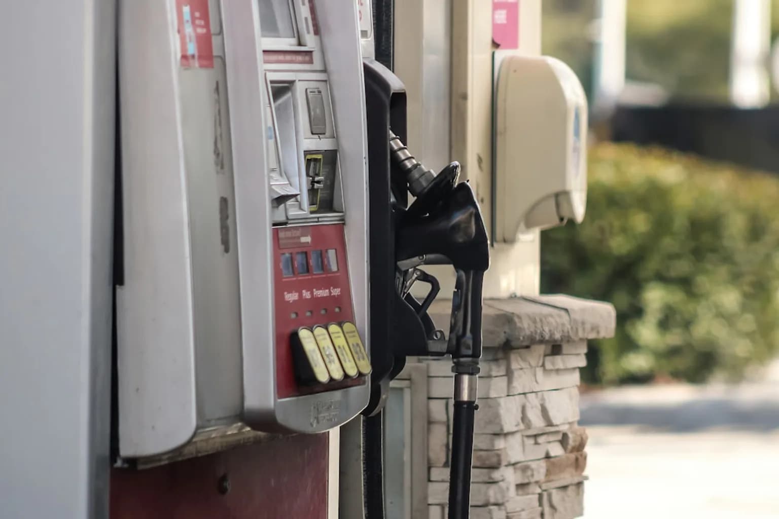 A diesel fuel pump at a petrol station showing a high price per gallon on the display