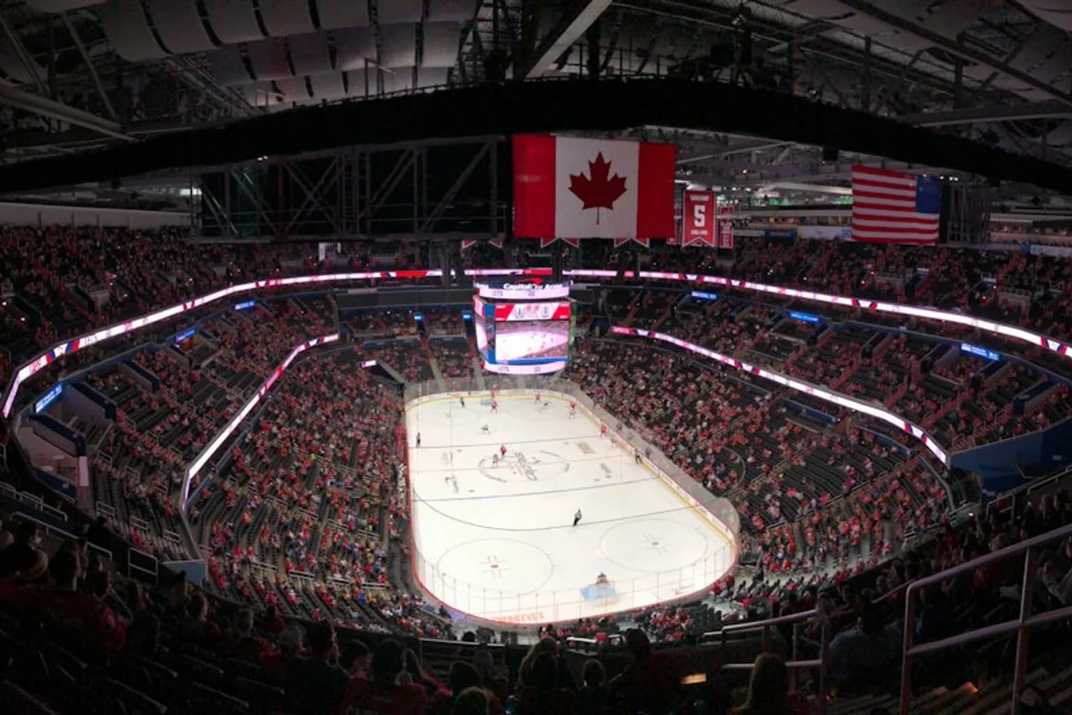 Ice hockey players compete during an IIHF World Championship match