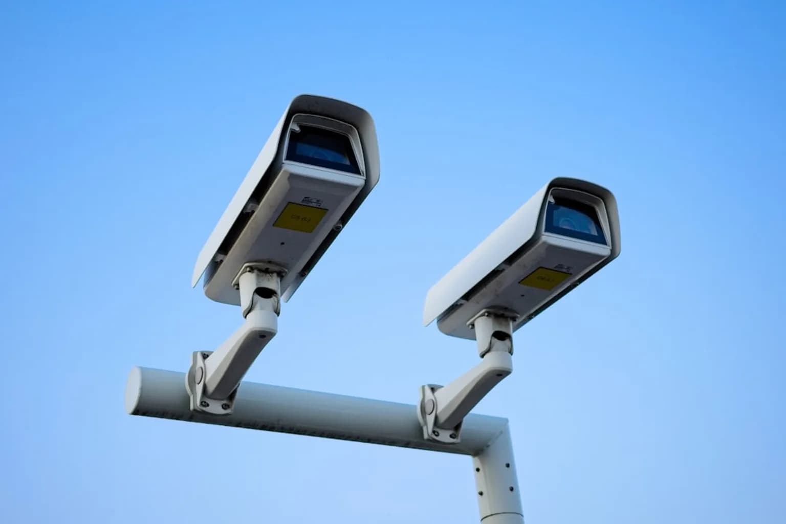 A Flock Safety automated license plate reader camera mounted on a pole