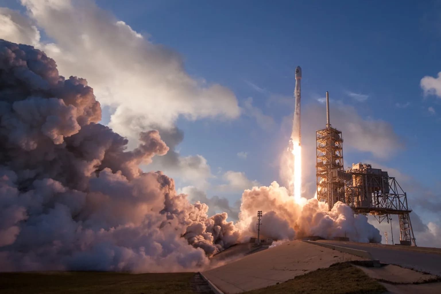 SpaceX Starship rocket lifting off from its Texas launch site on its first orbital flight