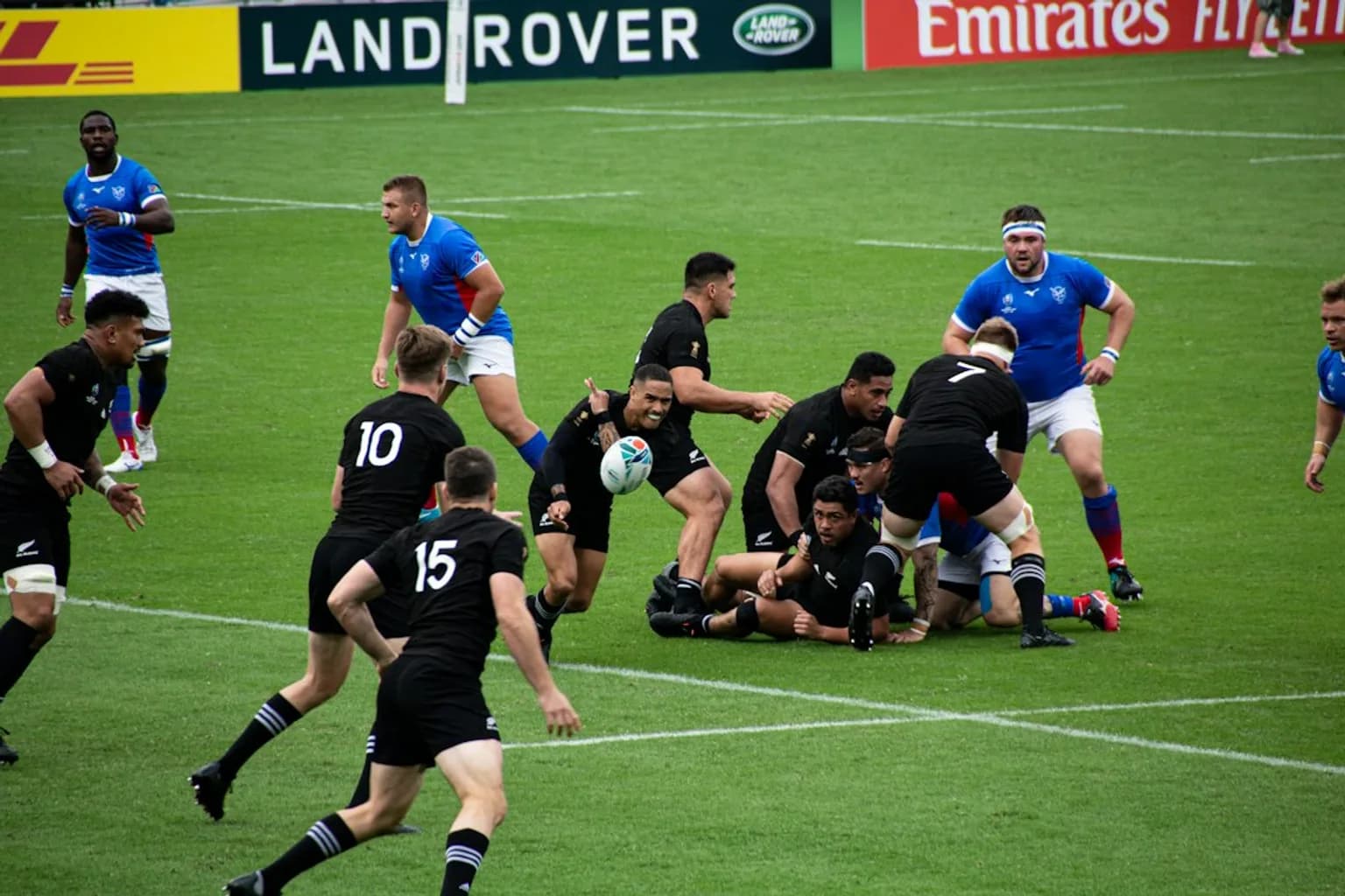 Rugby players training on a field in Japan in hot conditions