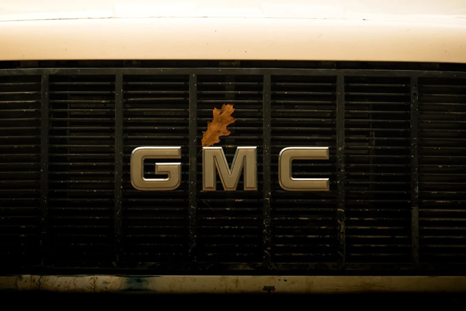 A General Motors OnStar connected-vehicle system badge on a vehicle interior