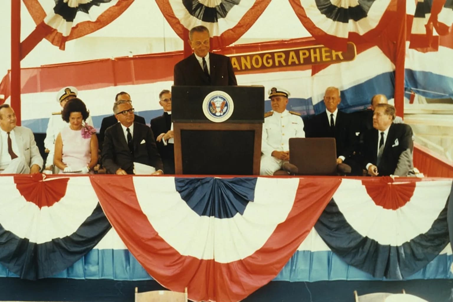 President Trump speaking at a Pentagon ceremony marking the 25th anniversary of the September 11 attacks, with military personnel and officials present.