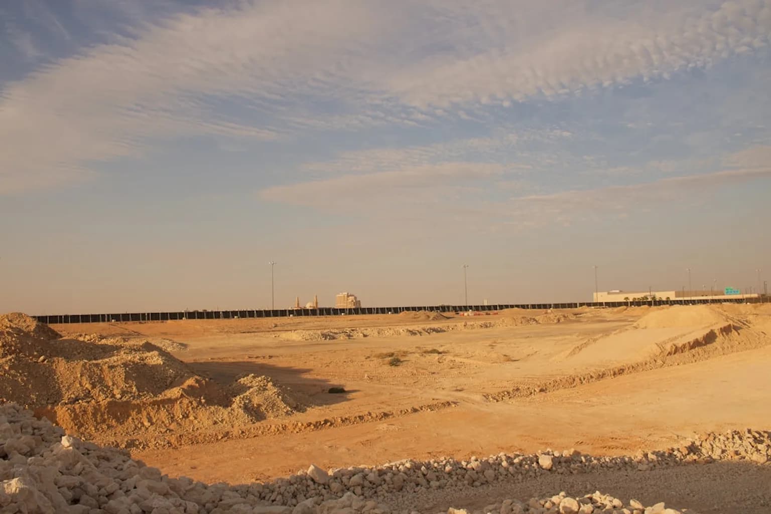 An oil pipeline stretching across the Saudi Arabian desert