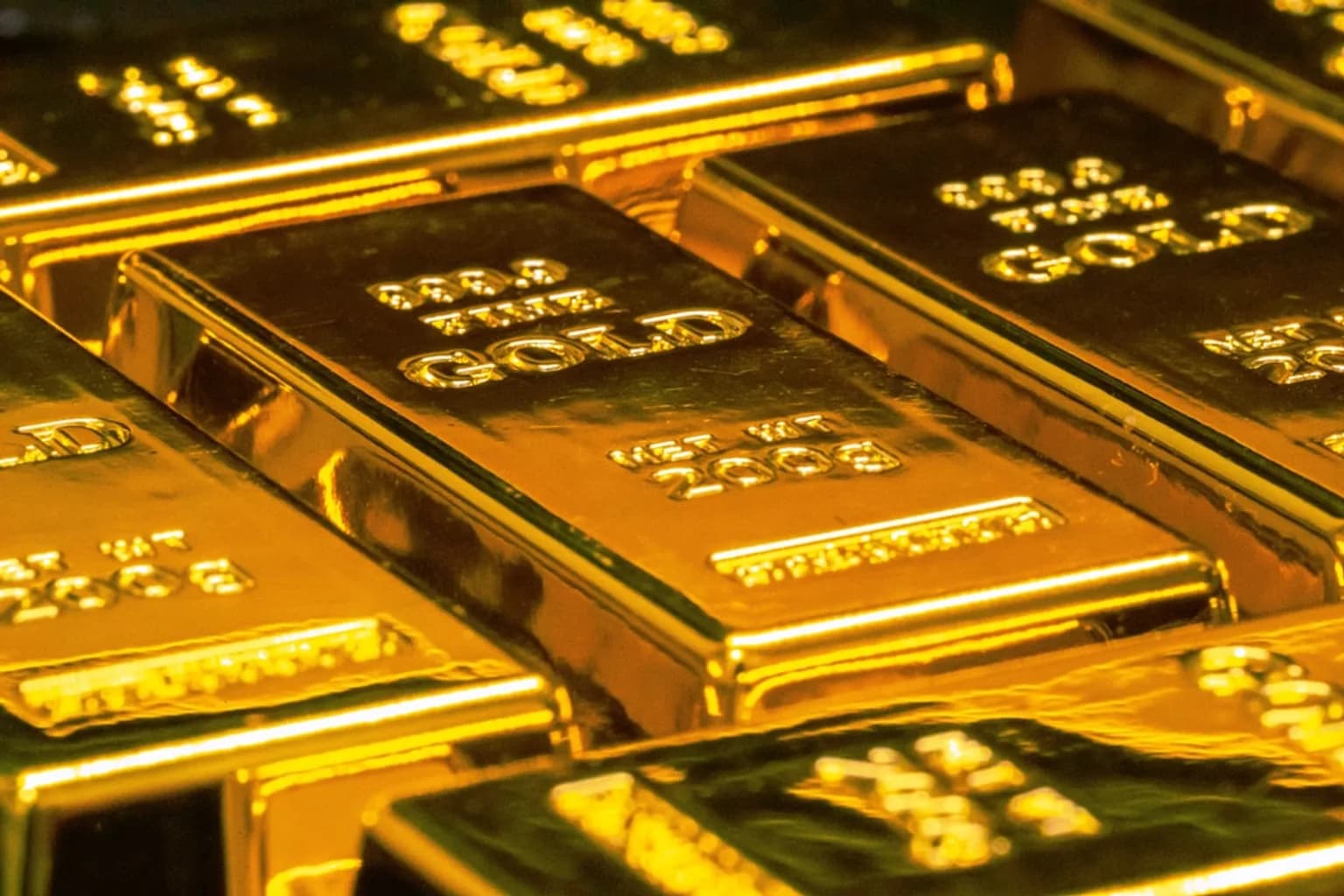 Stacked gold bars, similar to those seized from a former CIA officer's home in Ashburn, Virginia